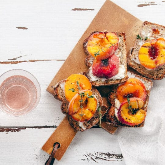 Peach and Heirloom Tomato Toast with Burrata