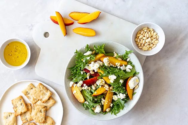 Peach salad with goat cheese